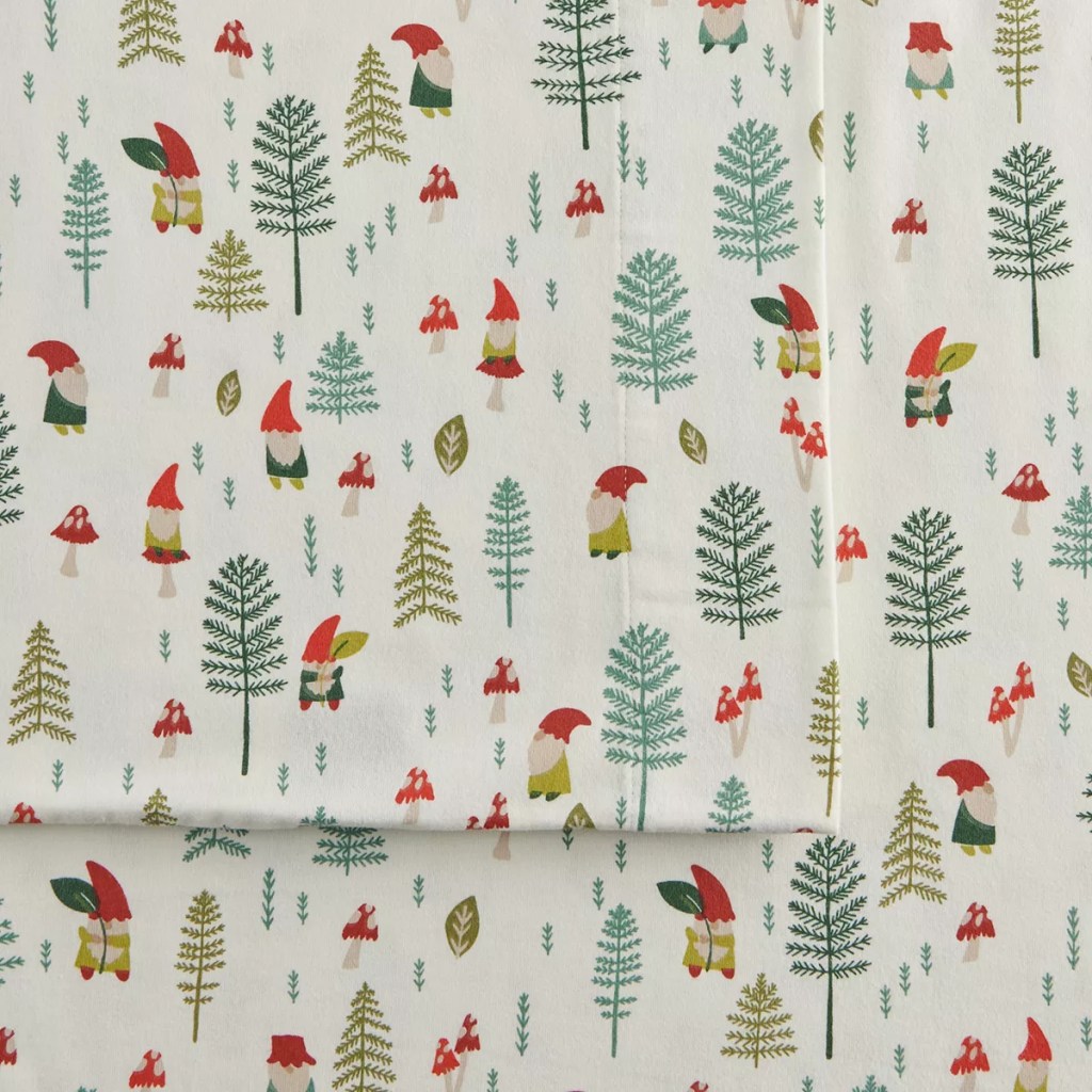 Image shows fleece bedsheets with forest gnome theme, and links to Kohls website.