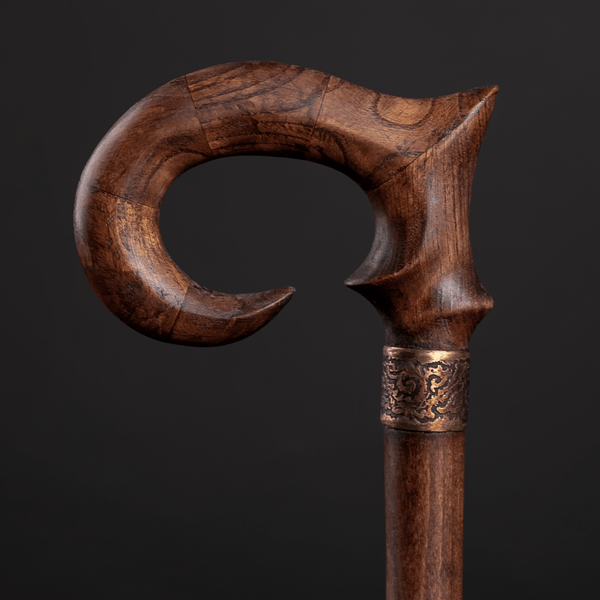 Image shows elegantly carved wooden cane, and links to Art Walking Sticks website.