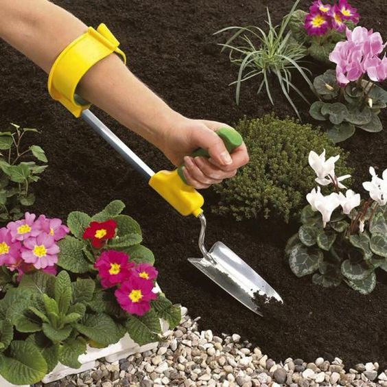 Image shows a modified garden trowel with arm grip and easy-to-hold handle, and links to Gardening Today website.