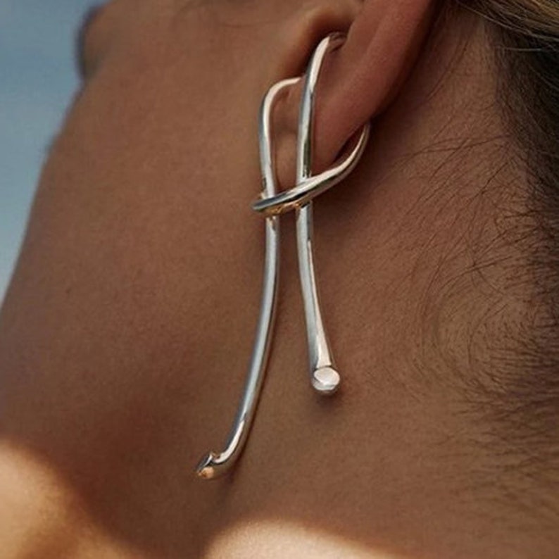 Image of silver cuff earring, with link to Etsy seller.