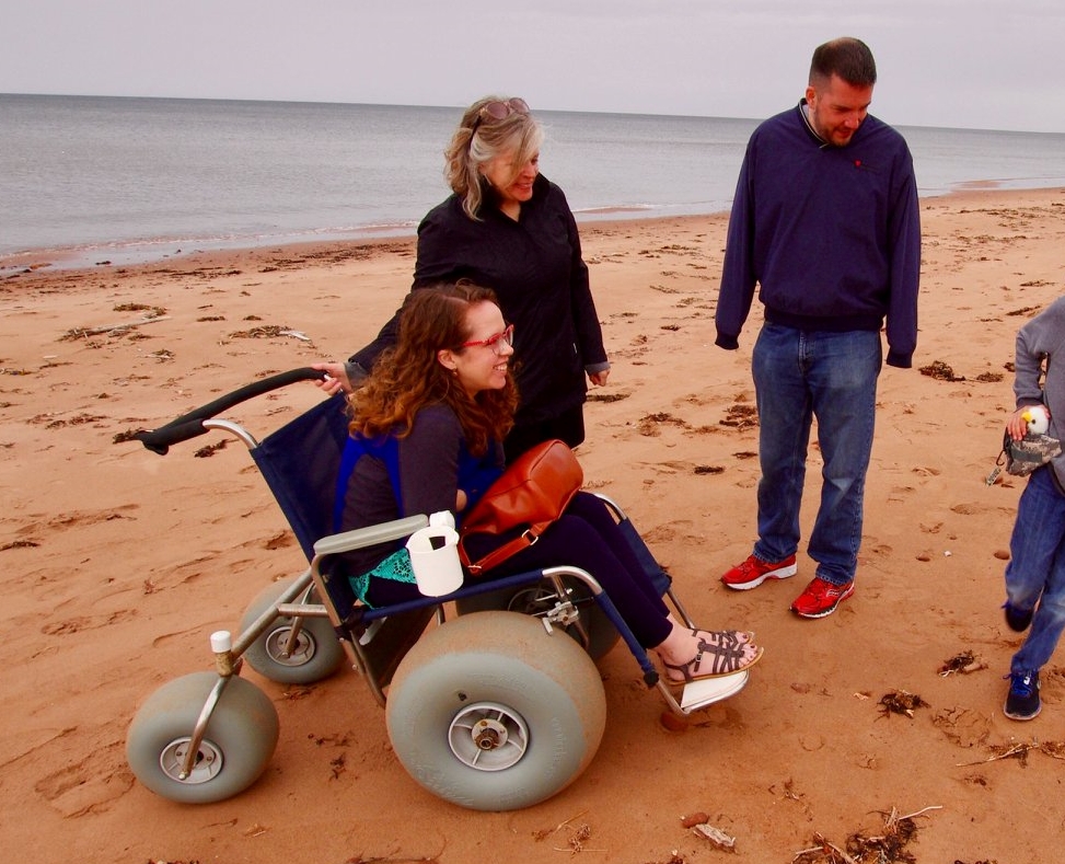 Image of author in beach wheelchair.
