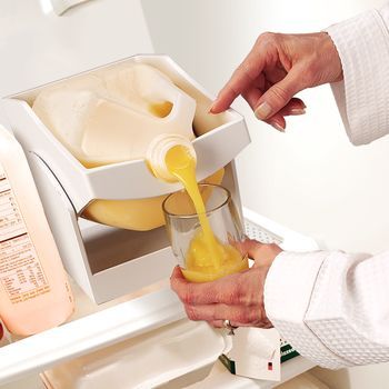 Image of plastic device to support and tip gallon jugs for pouring, with link to seller. 