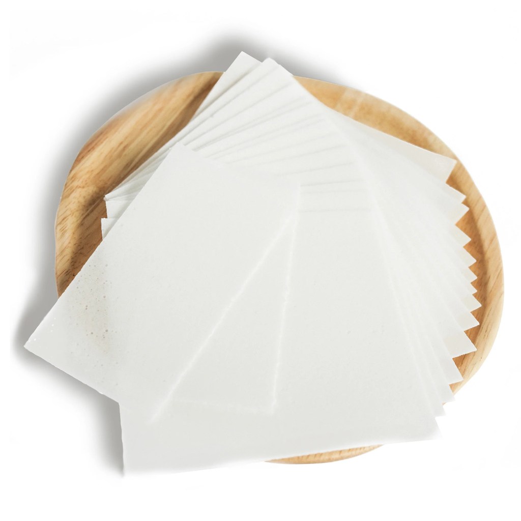 Image of laundry sheets in wooden bowl, with link to Well Earth Goods.