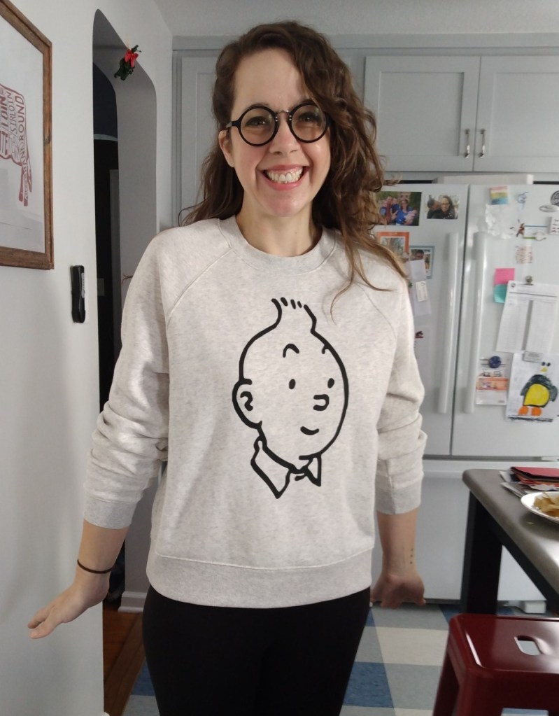Image of the author in a grey Tintin sweatshirt. 