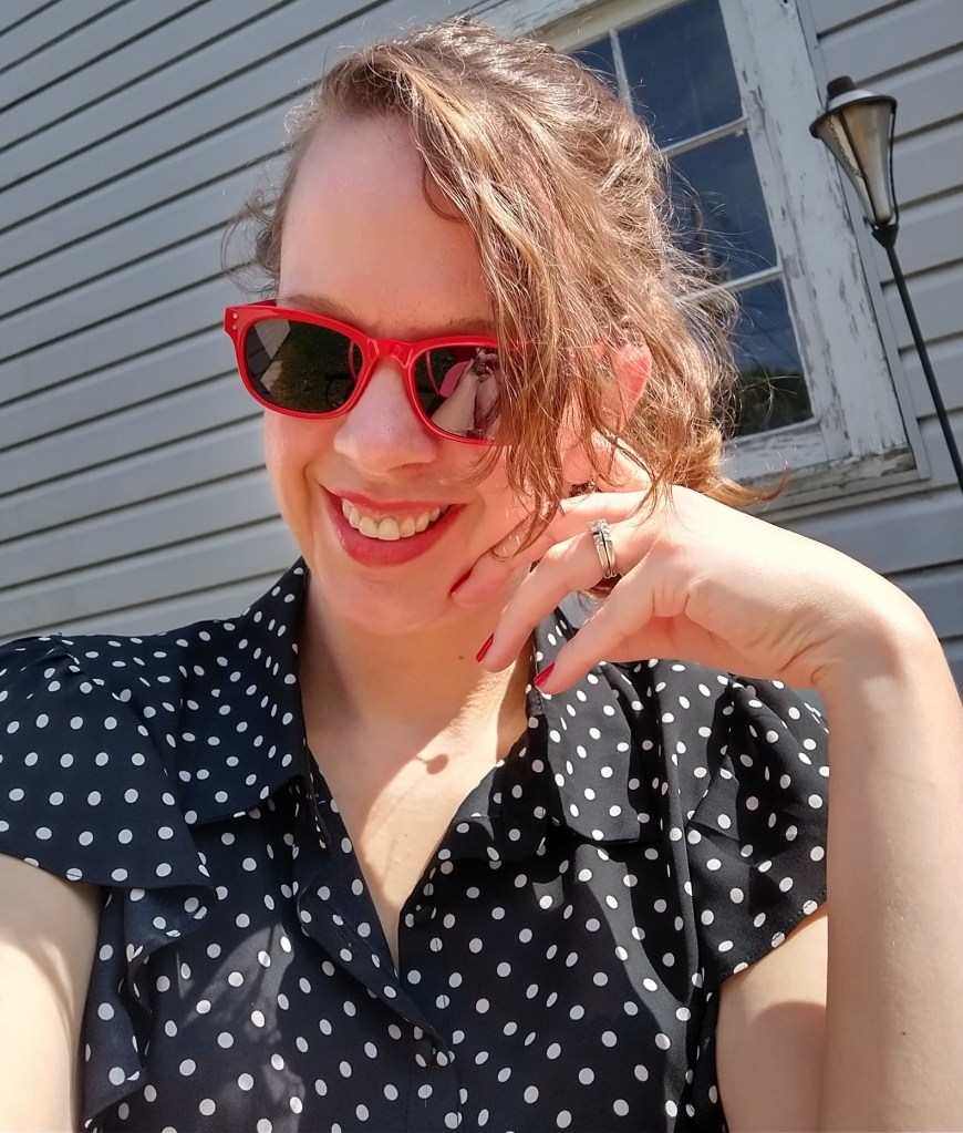 Image of the author with red sunglasses. 