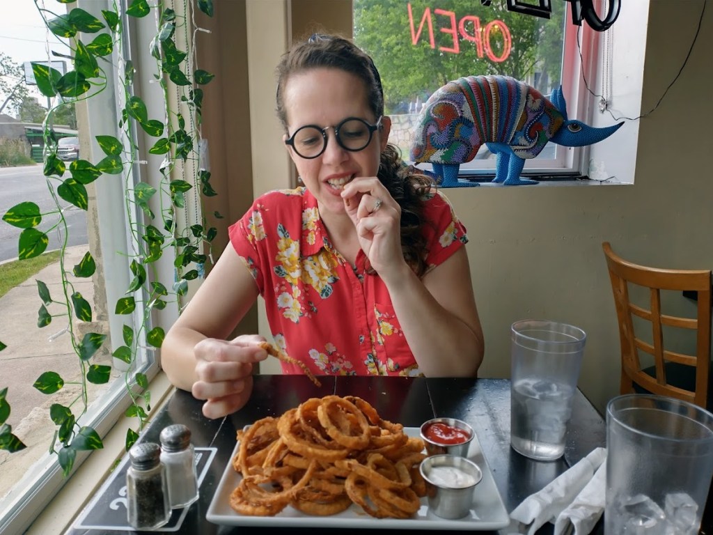 The author enjoys a plate of onion rings, by Livable by Design