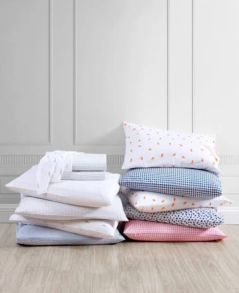 Image of stacked pillows, with link to Target website. 